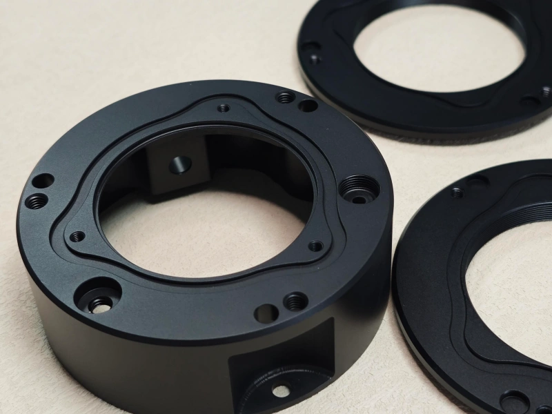 Camera housings and lens mounts