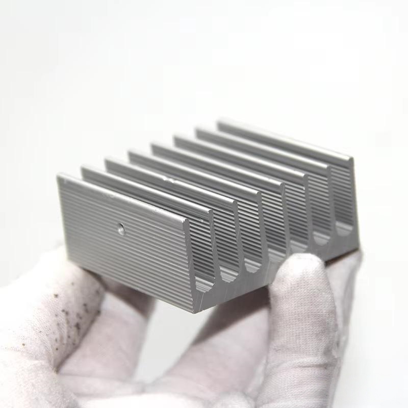Stamped heat sink fins