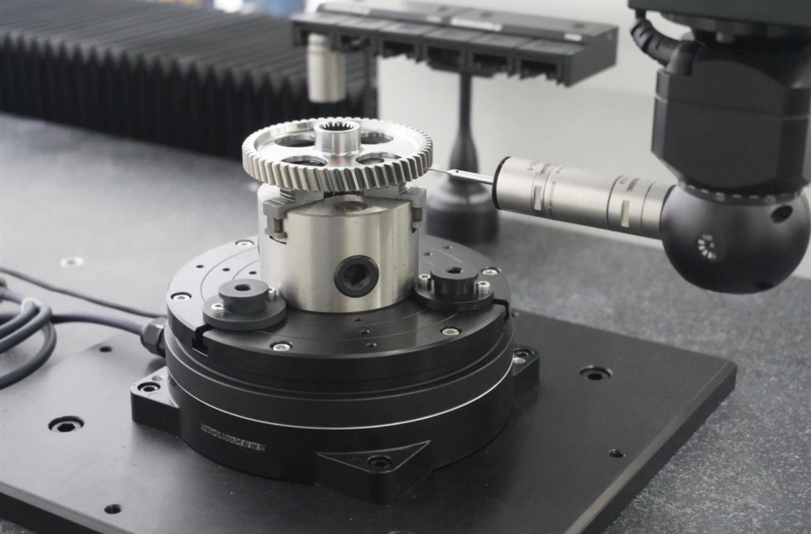 Gear quality inspection for tooth profile runout and bore concentricity