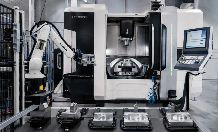 Automated CNC machining with robotic part loading